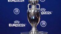 the UEFA Euro trophy on display few moments before the announcement of the elected country which will host the Euro 2024 fooball tournament during a ceremony at the headquarters of the European football's governing body in Nyon.