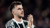 Manchester United's Mason Mount applauds his side's travelling supporters at the end of the match during the Premier League match between Brentford FC and Man Utd at Gtech Community Stadium on March 30, 2024