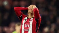 William Osula of Sheffield United reacts following defeat in the Premier League match between Sheffield United and Arsenal FC at Bramall Lane on March 04, 2024