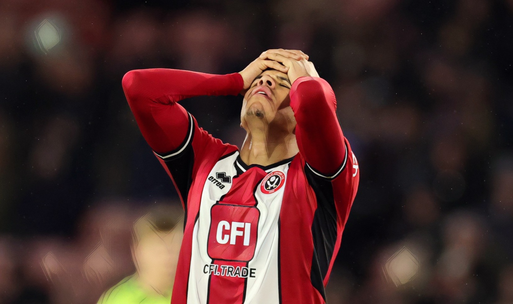 William Osula of Sheffield United reacts following defeat in the Premier League match between Sheffield United and Arsenal FC at Bramall Lane on March 04, 2024
