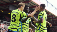 Arsenal players Martin Odegaard and Bukayo Saka