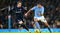 Rodri of Man City is challenged by Conor Gallagher of Chelsea during the Premier League match between Manchester City and Chelsea FC at Etihad Stadium on February 17, 2024 in Manchester, England. (Photo by Shaun Botterill/Getty Images)