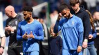 Birmingham City players George Hall and Tyler Roberts are looking dejected after the Sky Bet Championship match between Birmingham City and Norwich City at St Andrews in Birmingham, on May 4, 2024, which saw the club get relegated to League One.