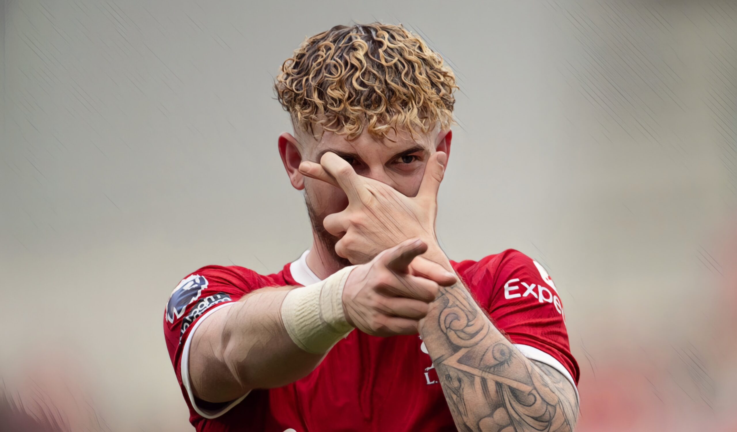 Harvey Elliott of Liverpool celebrates scoring during the Premier League match between Liverpool FC and Tottenham Hotspur at Anfield on May 5, 2024 in Liverpool, England.