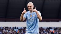 Erling Haaland of Manchester City celebrates after scoring a goal to make it 1-0 during the Premier League match between Man City and Wolverhampton Wanderers at Etihad Stadium on May 4, 2024 in Manchester, England.