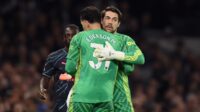 Stefan Ortega of Manchester City embraces teammate Ederson as he is substituted during the Premier League match between Tottenham Hotspur and Man City at Tottenham Hotspur Stadium on May 14, 2024