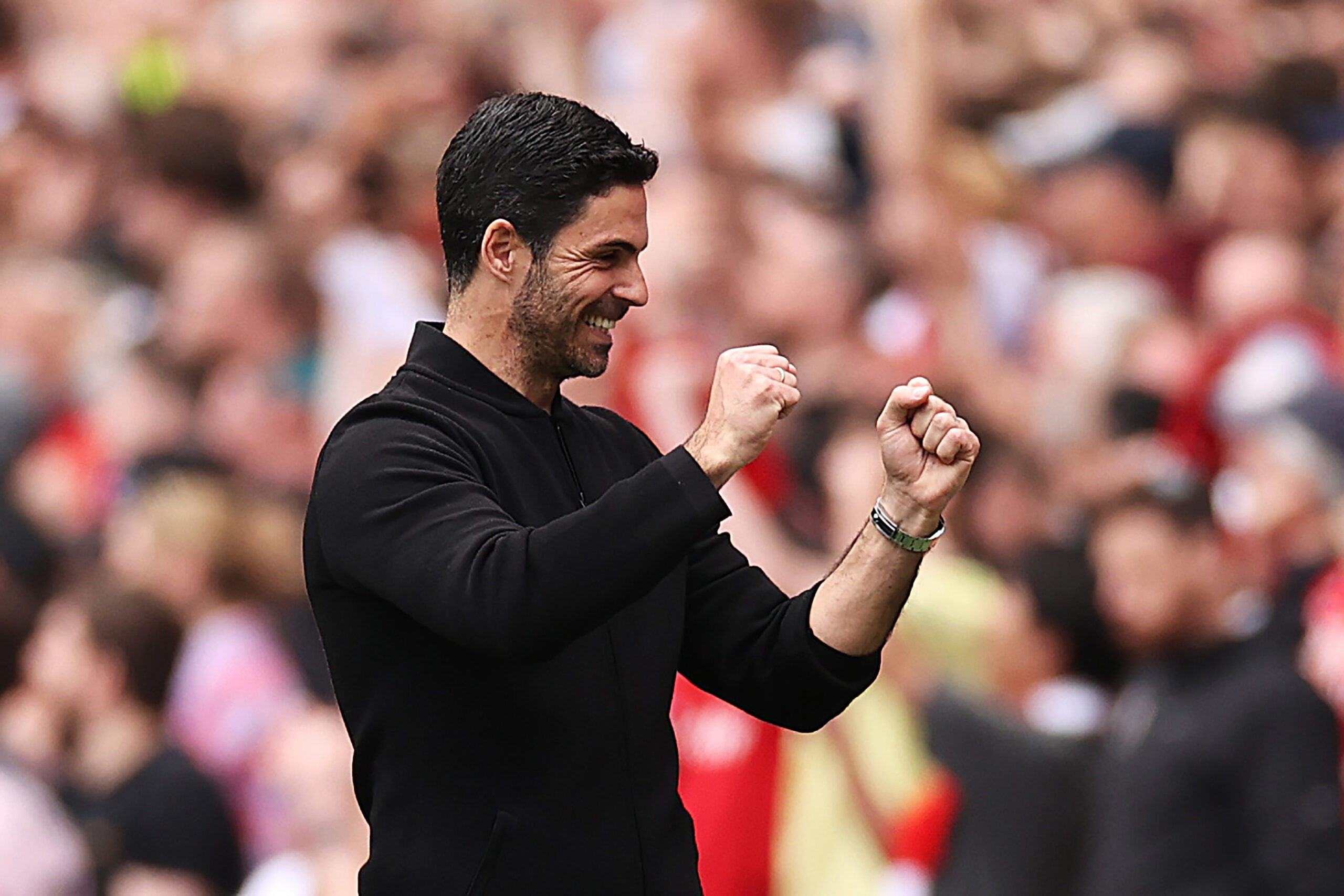 Mikel Arteta, Manager of Arsenal, celebrates his team's first goal scored by Bukayo Saka of Arsenal (not pictured) from a penalty kick during the Premier League match between Arsenal FC and AFC Bournemouth at Emirates Stadium on May 04, 2024 in London, England.